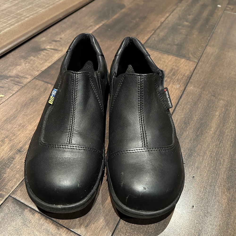 Black steel toe Slip-On women’s Shoes, excellent condition. Sz 7